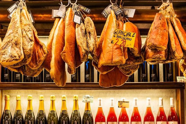 Italy-Rome Piazza della Rotunda-meat (hams) and wine for sale at Salami Antica